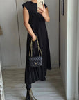 Chic Sleeveless Dress with Flowing Pleats