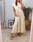 Chic Sleeveless Dress with Flowing Pleats