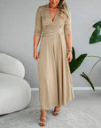 Elegant solid color V-neck three-quarter sleeve dress