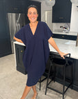 Chic Black Flow Dress with Handy Pockets