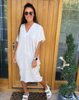 Chic Black Flow Dress with Handy Pockets