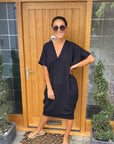 Chic Black Flow Dress with Handy Pockets