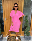 Chic Black Flow Dress with Handy Pockets